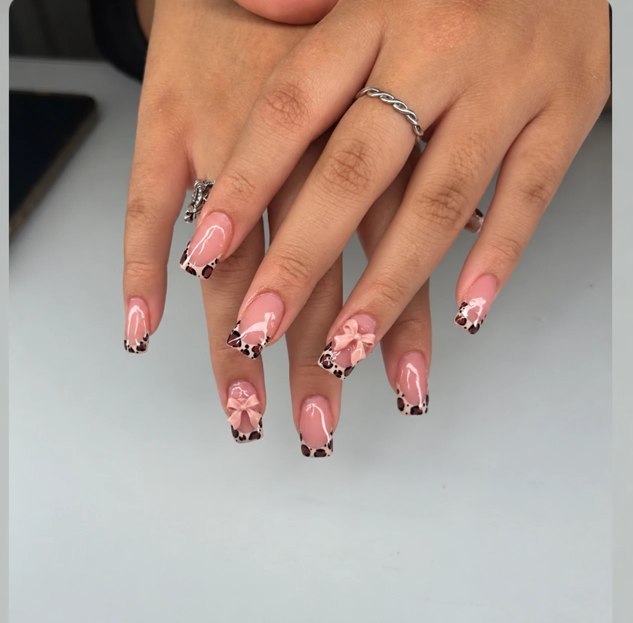 Leopard French tips with pink bows